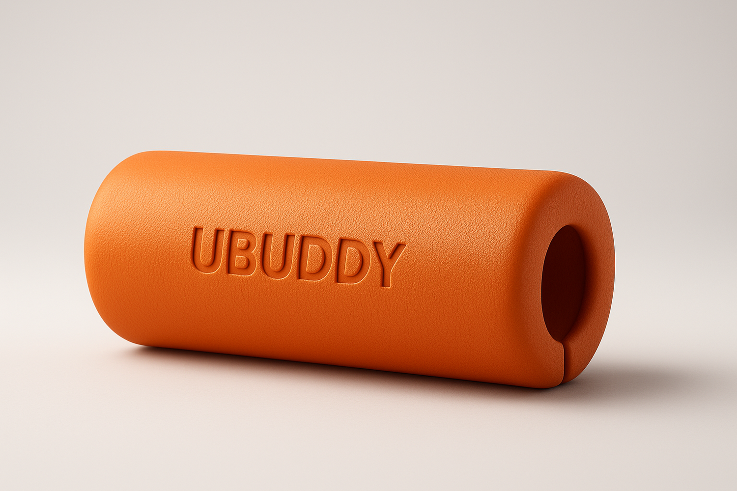 Orange foam roller with 'UBUDDY' branding on a light background